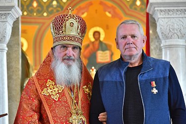 Александр Куниловский награжден медалью за помощь в строительстве храма